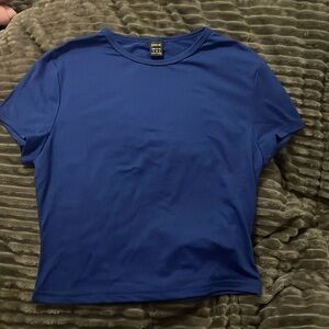 Royal blue cute top, never worn, & good condition!